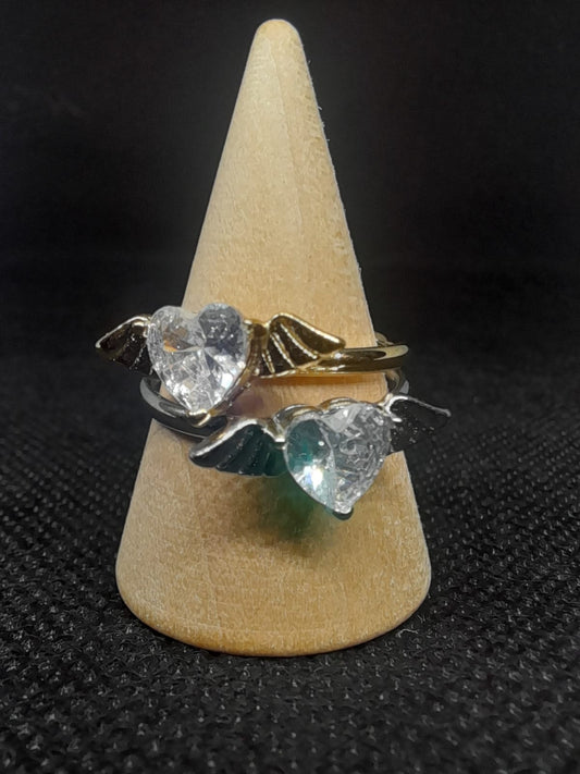 Anello Cuore e Ali – Eleganza in Acciaio Regolabile