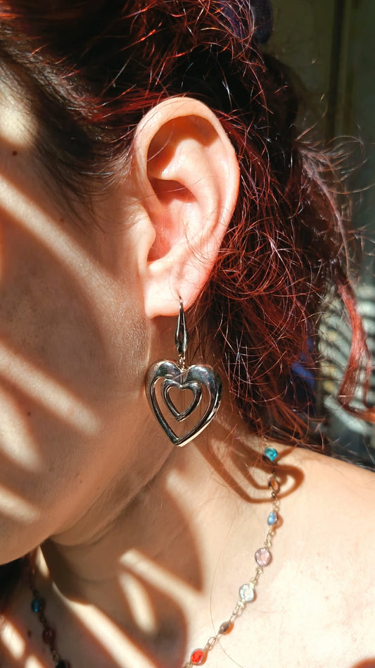 Orecchini cuori fusi